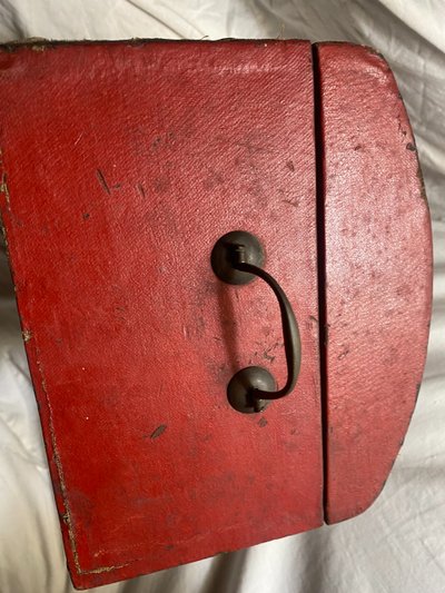 19th century red lacquered domed studded and strapped table box