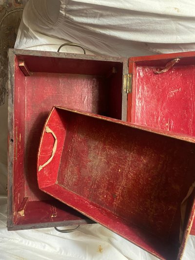 19th century red lacquered domed studded and strapped table box