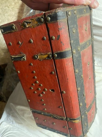 19th century red lacquered domed studded and strapped table box