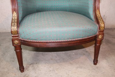 Pair of Louis XVI style mahogany bergere chairs, 19th century