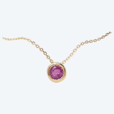 Yellow gold and ruby solitaire necklace