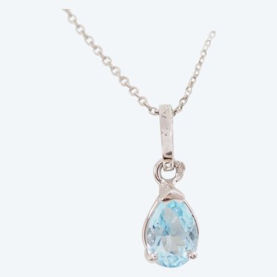 White gold and blue topaz solitaire necklace