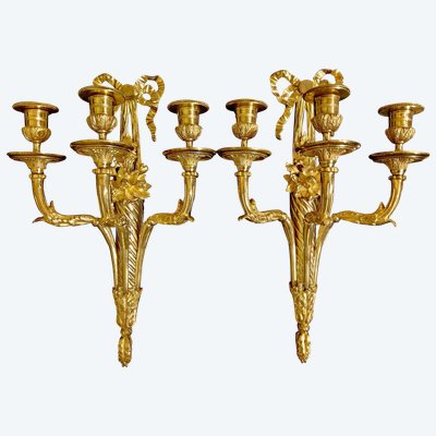 Pair of three-light gilded bronze wall lights with Cornucopias Louis XVI style 19th century