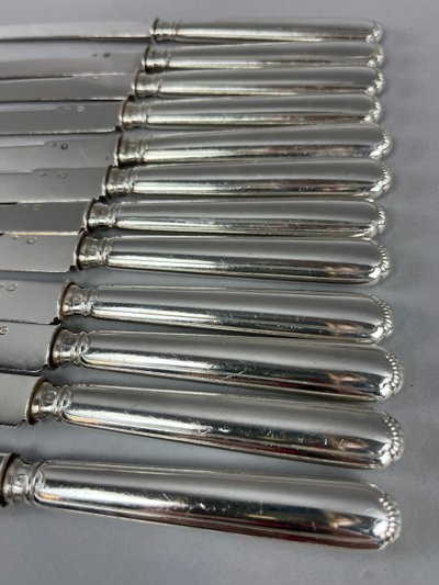 Suite of 36 silver table, cheese and fruit knives