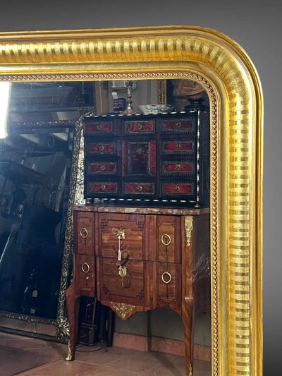 LARGE LOUIS PHILIPPE PERIOD MIRROR IN WOOD AND GILDED STUC (gilded leaf)