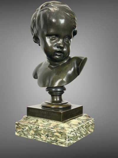 PATINATED BRONZE BUST OF A PUTTO AFTER FRANCOIS DUQUESNOY ON MARBLE BASE