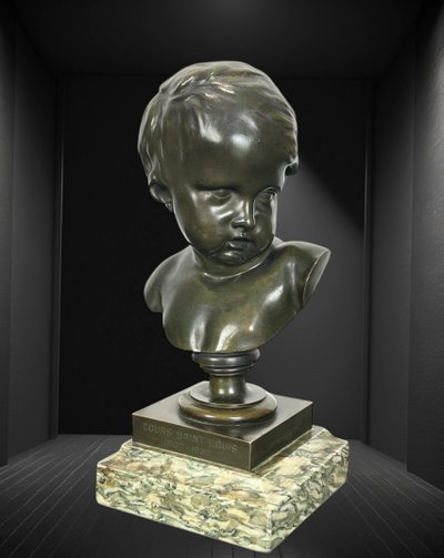 PATINATED BRONZE BUST OF A PUTTO AFTER FRANCOIS DUQUESNOY ON MARBLE BASE