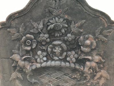 Antique cast iron fireback from the 19th century