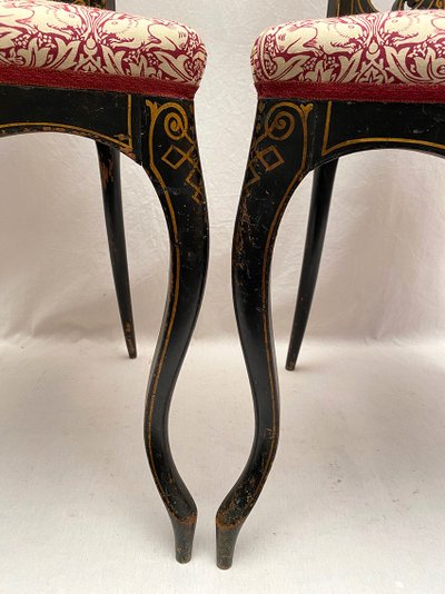 Pair of Napoleon III chairs, blackened wood and gold decor