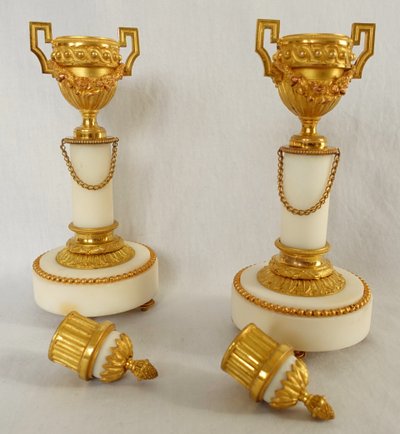 Pair of gilt bronze and marble cassolettes with upside-down candlesticks, Louis XVI style