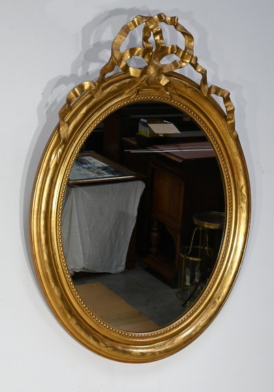 Oval mirror in gilded wood, Louis XVI style, Napoleon III period - Mid-19th century