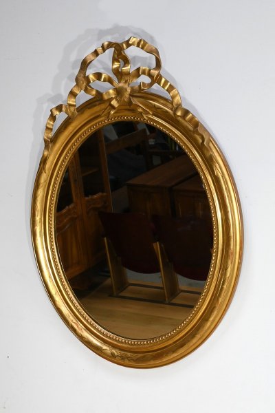 Oval mirror in gilded wood, Louis XVI style, Napoleon III period - Mid-19th century