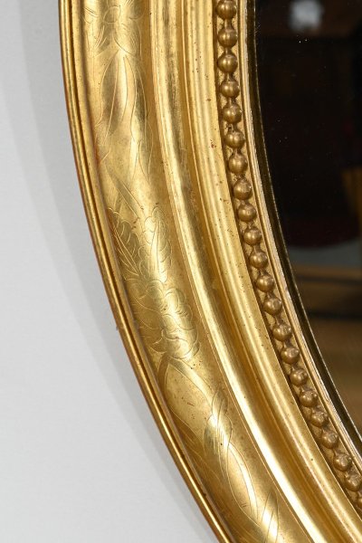 Oval mirror in gilded wood, Louis XVI style, Napoleon III period - Mid-19th century