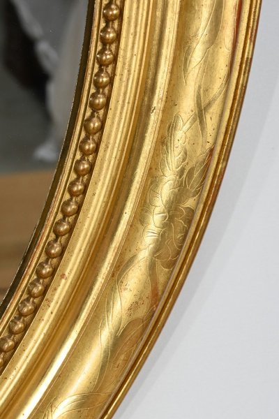 Oval mirror in gilded wood, Louis XVI style, Napoleon III period - Mid-19th century