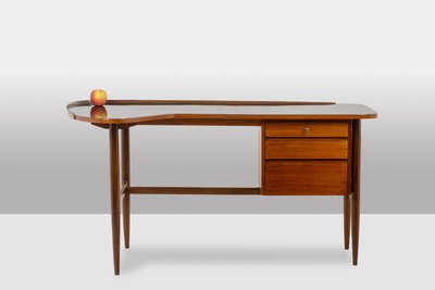 Free-form teak desk. 1950s. LS614859Q