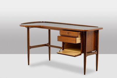 Free-form teak desk. 1950s. LS614859Q