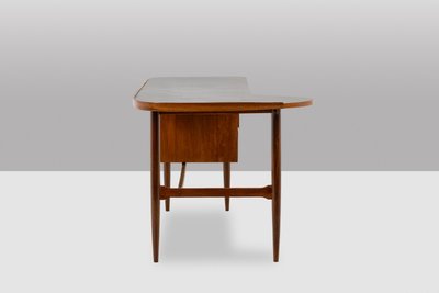 Free-form teak desk. 1950s. LS614859Q