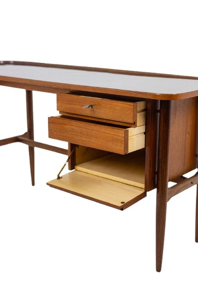 Free-form teak desk. 1950s. LS614859Q