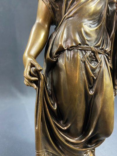 19th-century bronze sculpture of an antique woman with a foliage crown