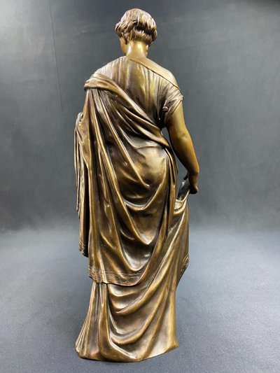 19th-century bronze sculpture of an antique woman with a foliage crown