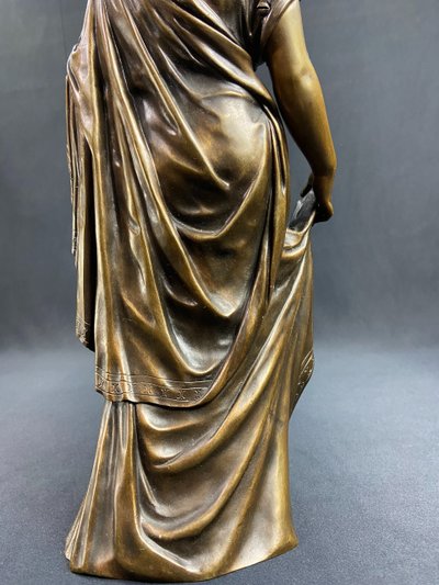 19th-century bronze sculpture of an antique woman with a foliage crown