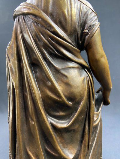 19th-century bronze sculpture of an antique woman with a foliage crown