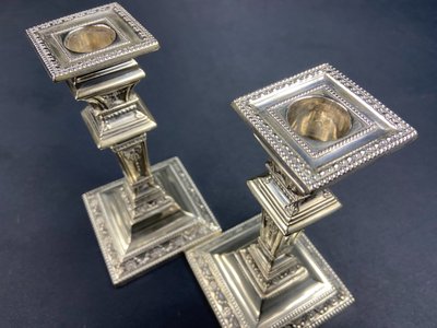 Pair of Victorian Neo-Classical silver-plated candlesticks