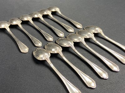 Complete set of 12 Louis XV style silver plated moka spoons signed Hermès