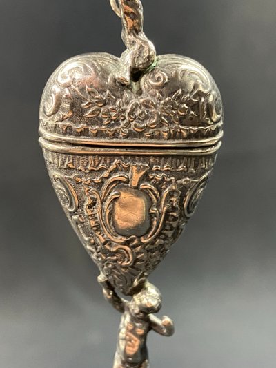 19th century Louis XV style solid silver reliquary pendant box with Putti decoration