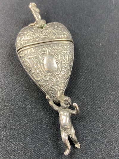 19th century Louis XV style solid silver reliquary pendant box with Putti decoration