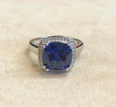 Blue stone and zircon ring