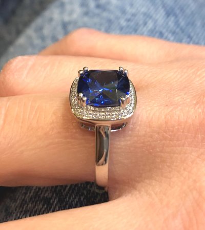 Blue stone and zircon ring