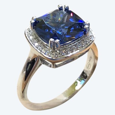 Blue stone and zircon ring