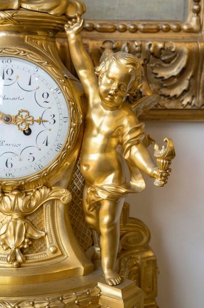 Orologio a forma di gallo in bronzo dorato del XIX secolo