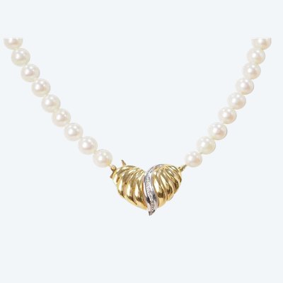 Necklace in yellow gold and cultured pearls