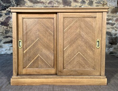 Antique oak cabinet with sliding door