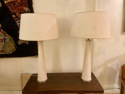 Pair of modernist stone and bronze lamps.