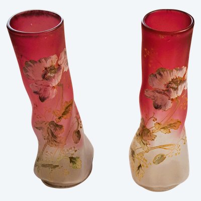 Pair of François Théodore Legras vases in enamelled twisted glass on a pink background with floral decoration, early 20th century