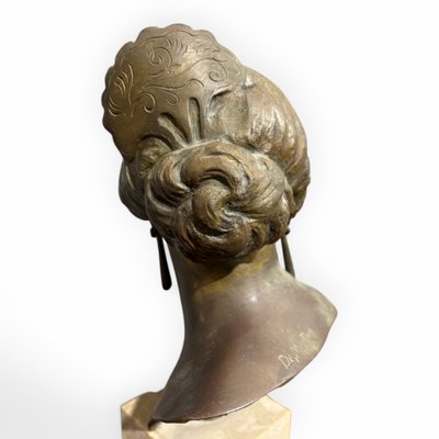 Ancient bronze Maiden De Martino