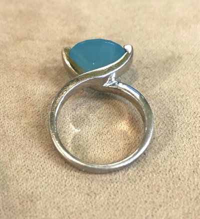 Silver ring with blue stone