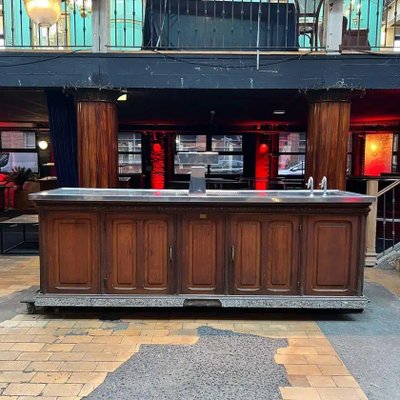 Oak bar counter with stainless steel top