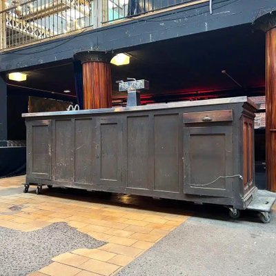 Oak bar counter with stainless steel top