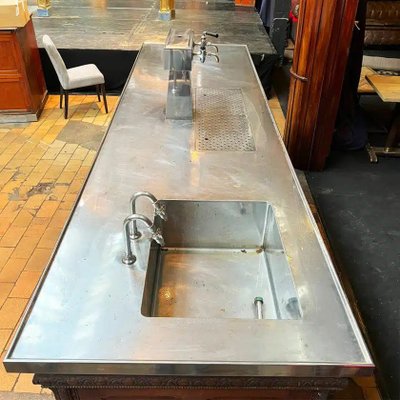 Oak bar counter with stainless steel top