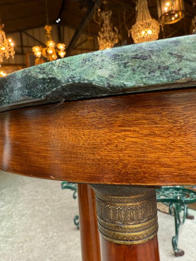 Pair of Empire style mahogany pedestal tables, veined marble top