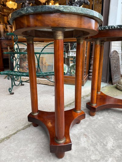 Pair of Empire style mahogany pedestal tables, veined marble top