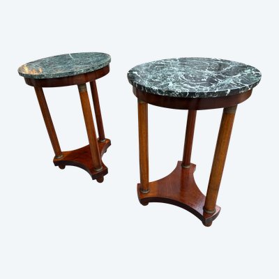 Pair of Empire style mahogany pedestal tables, veined marble top