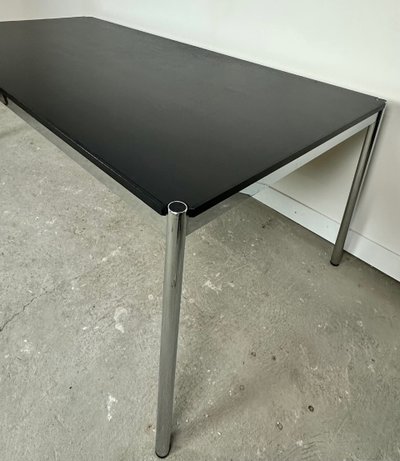 USM Haller T59 table in black laminate and chrome steel