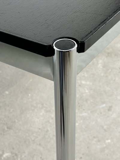 USM Haller T59 table in black laminate and chrome steel