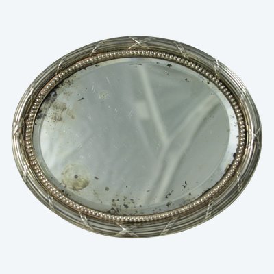 Small oval beveled mirror with solid silver frame circa 1900