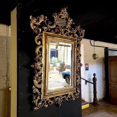 Louis XV Rocaille Style Gilded Wood and Stucco Mirror